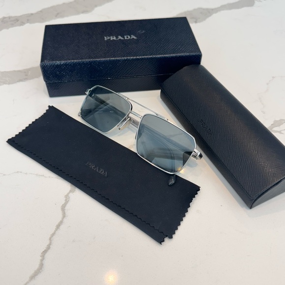 Prada Other - Prada Silver frame Sunglasses new in Box. 100% Authentic guaranteed